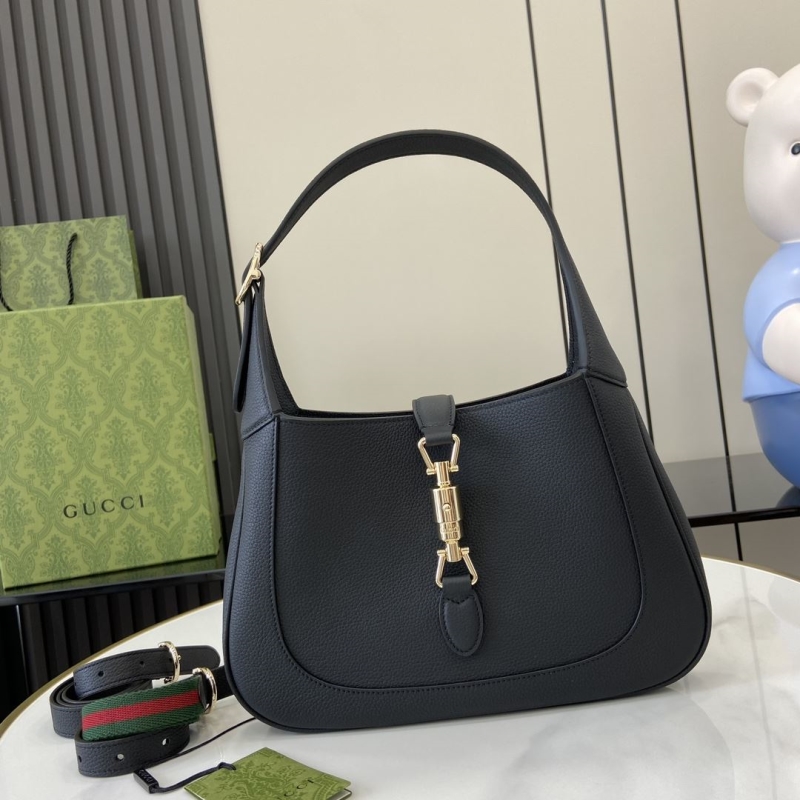 G*u*i top handle bags